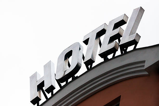 istock Hotel sign against white background, copy space 522311561