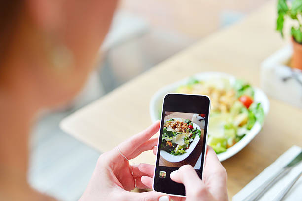 istock Smartphone taking picture from salad 522311756