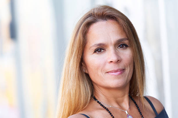 istock Mature hispanic woman smiling 522312307
