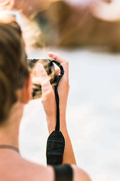 istock Girl making shoot on the beach make shoot 522312652