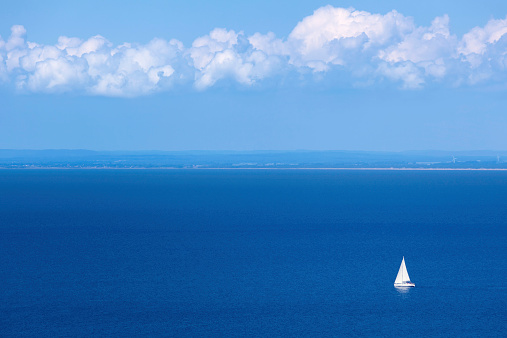 A sailboat travelling the seas along the southern west coast of Sweden.