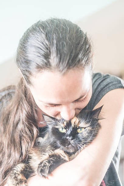 istock Young woman and her cat 522313246