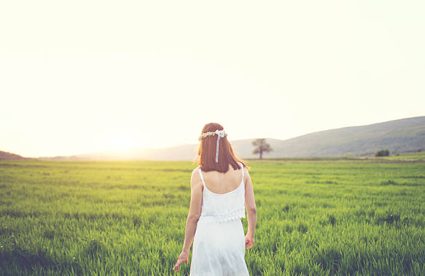 istock Girl is walking through nature 522313948