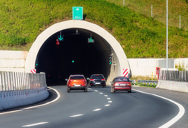 istock Cars entering in tunnel 522315433