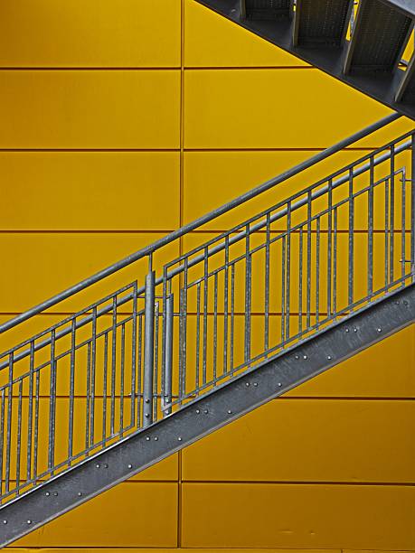 istock Metal Staircase and Yellow Wall 522316072