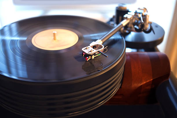 istock Vintage turntable playing vinyl record 522316456