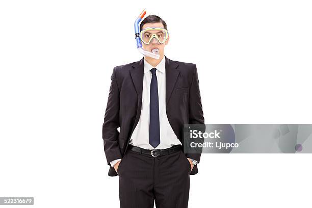 Businessman With A Diving Mask Stock Photo - Download Image Now - Studio Shot, Swimming Goggles, 20-29 Years