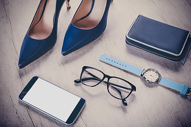 istock business woman outfit with comunication gadgets 522318624