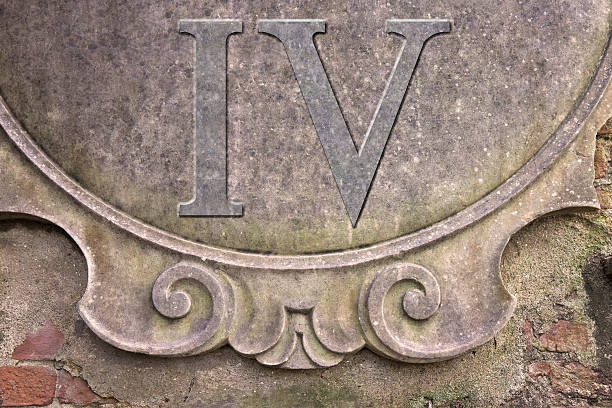 istock Roman number IV written on stucco wall 522318743