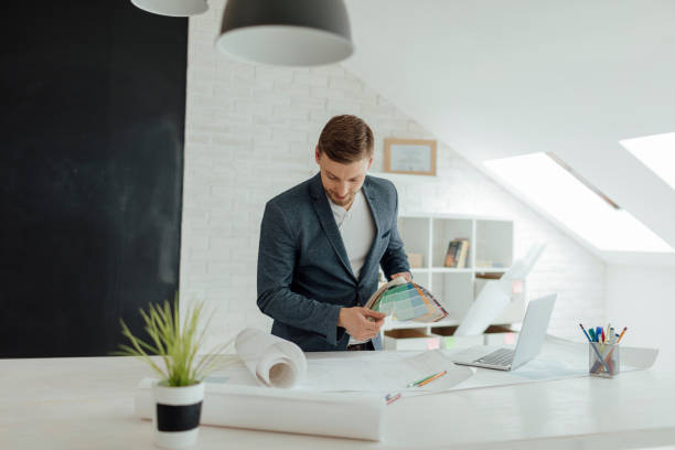 istock Architect Choosing Color For New Project In The Office. 522318802