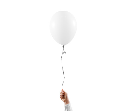 Hand hold blank white balloon mock up isolated. White balloon art design mockup holding in hand. Clear baloon template. Logo, texture, pattern presentation design element.