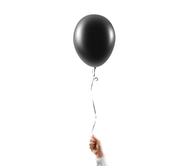 istock Hand hold blank black balloon mock up isolated. Balloon art 522319462