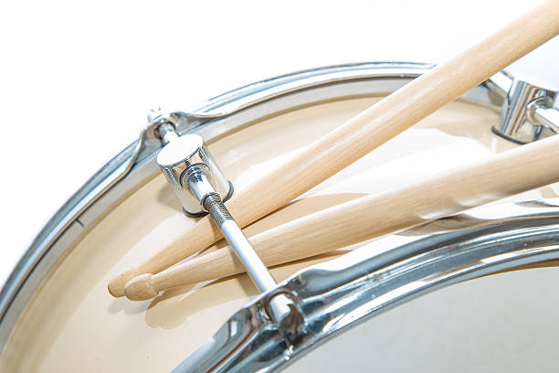 istock Wood snare drum and drumsticks isolated 522320350