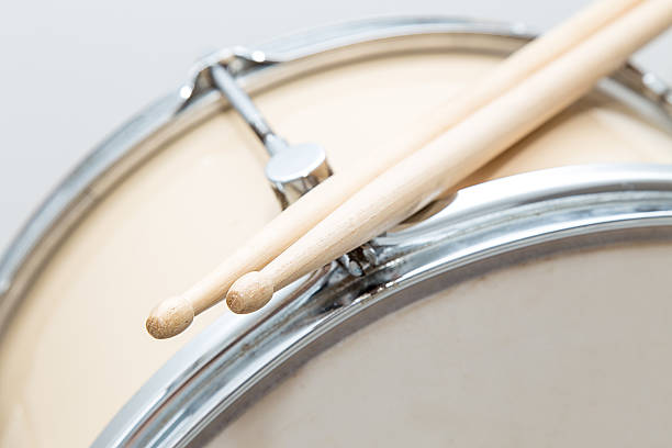 istock Wood snare drum and drumsticks isolated 522321132