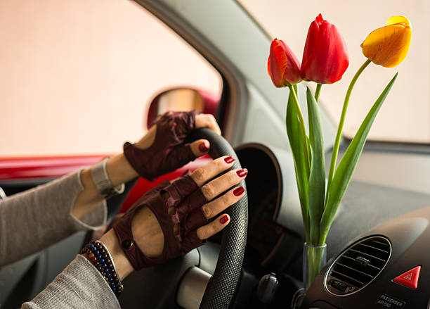 istock Red and yellow tulips bring joy woman when driving 522321440