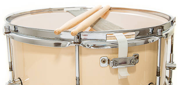 istock Wood snare drum and drumsticks isolated 522322084
