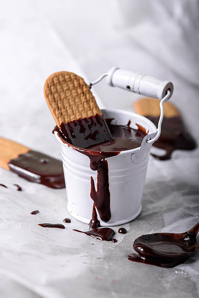 istock On a light background a lot of liquid dark chocolate 522323214