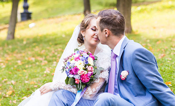 istock Bride and groom on a romantic moment outdoors 522323916