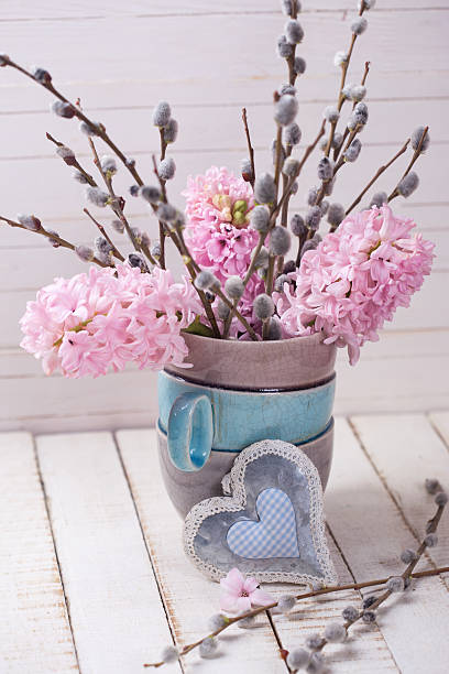 istock Background with hyacinths and willow branches in vase and decora 522324600