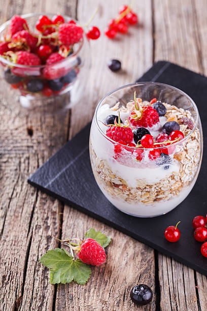 istock Breakfast with muesli, yogurt,honey and fresh berries 522325038