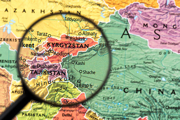 Map of Kyrgyzstan and Tajikistan Map of Kyrgyzstan and Tajikistan. Detail from the World Atlas. Selective Focus. kyrgyzstan photos stock pictures, royalty-free photos & images