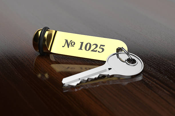 istock Hotel room key with golden lable 522328966