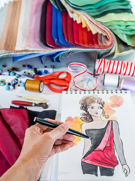 istock Fashion designer drawing illustration with material 522329449
