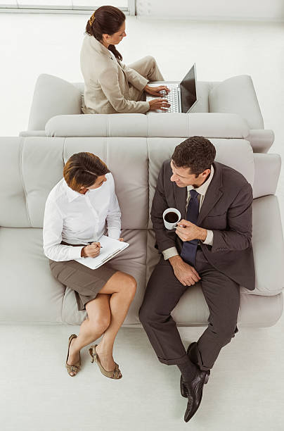 istock Business people sitting on couch 522330047