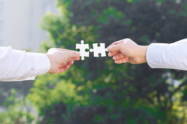 istock puzzle jigsaw and concept with trees background 522330411