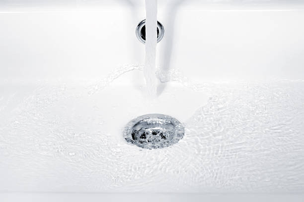 istock Water flowing, ripples and bubbles in sink 522331060