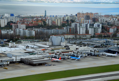 Lisbon, Portugal - April 3, 2007: several aircraft at Lisbon International Airport Terminal 1 building