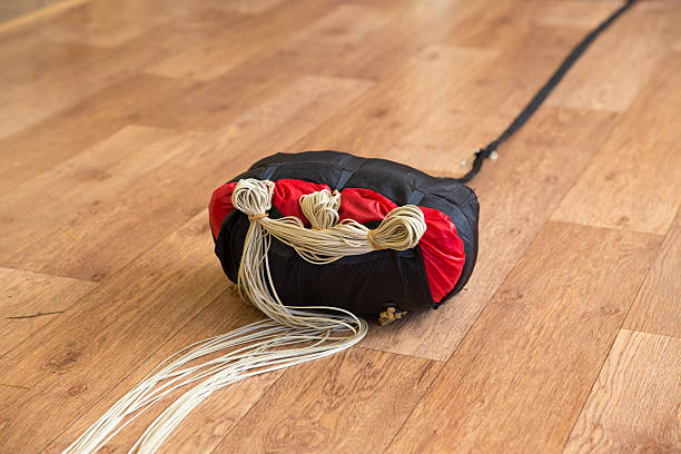istock parachute in the bag with the straps on the floor 522331429