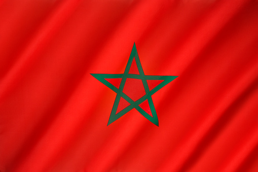 The flag of Morocco - Red has considerable historic significance in Morocco, proclaiming the descent of the royal Alaouite family from the Islamic prophet Muhammad via Fatima, the wife of Ali, the fourth Muslim Caliph.