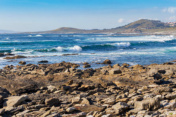 istock Rocks and wave surf on Insua Cape 522332622