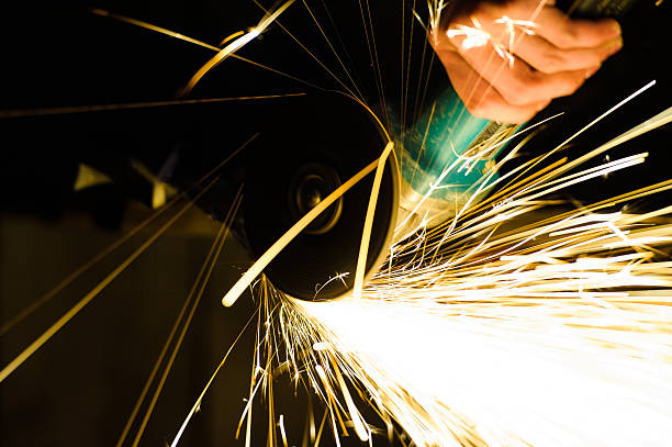 istock Metal grinding on steel pipe close up 522332989