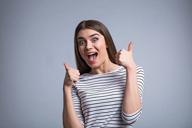 istock Positive girl thumbing up 522333040