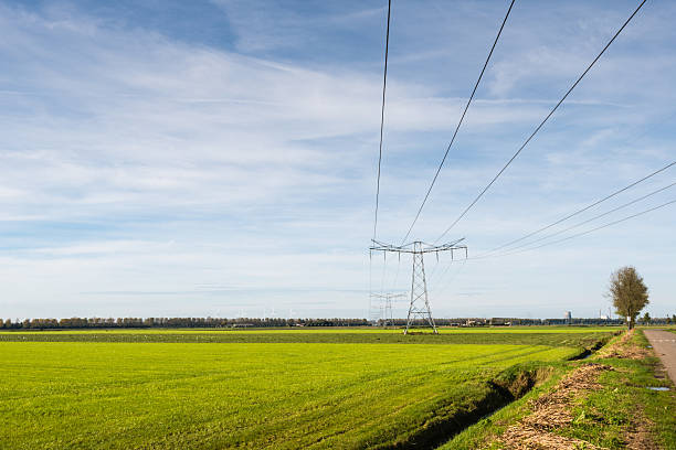istock Power lines and pylons in a rural landscape 522334121