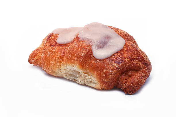 istock Fresh croissant with sugar isolated on white 522342825
