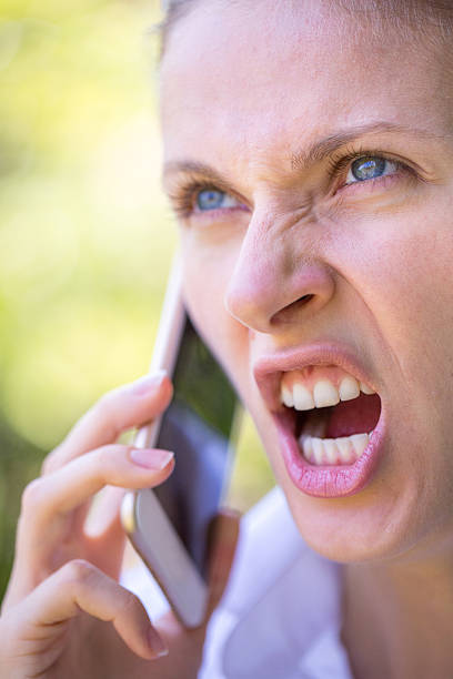 istock Woman angry on the phone 522343125