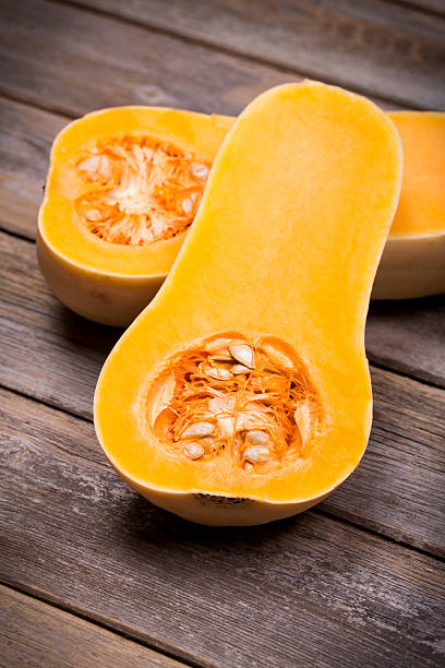 istock Sliced butternut squash over old wood 522343377