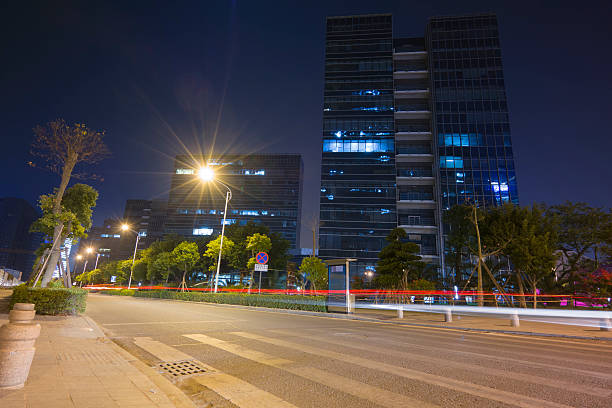 istock Road and modern building at night 522343459