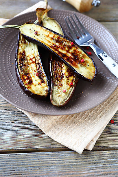 istock fried aubergine with spice on a plate 522343525