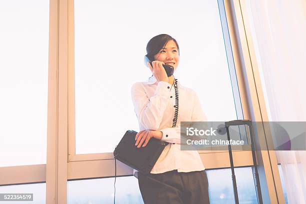 Asian Businesswoman Talking On The Phone Stock Photo - Download Image Now - Adult, Adults Only, Asia