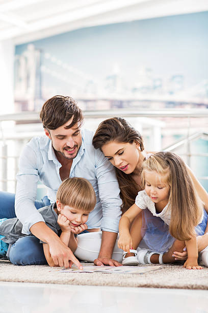 istock Family reading magazine. 522355363