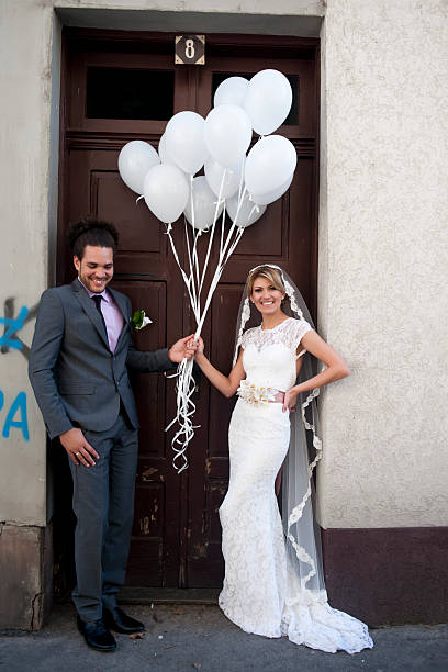 istock Married couple with balloons 522355733
