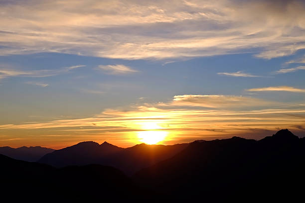 istock Sunrise. Layers of  Mountains. Clouds. 522371164