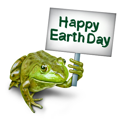 Earth day frog holding a sign in protest as an ecxological concept as a group of frogs coming together to form text as an environmental symbol for protection of endagered habitat 3D illustration.