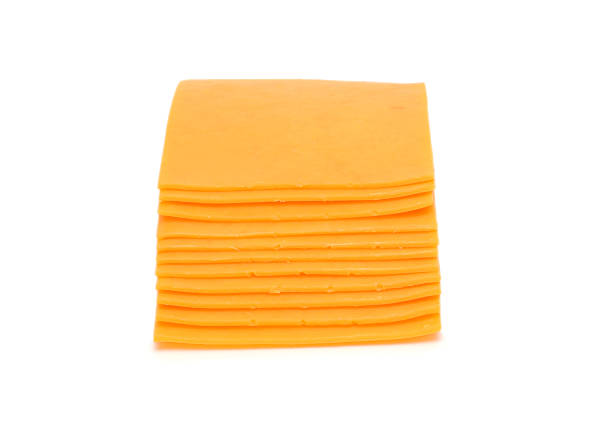 istock cheese slices isolated on the white background 522372462