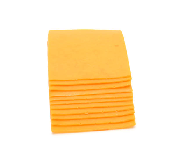 istock cheese slices isolated on the white background 522372530