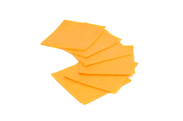 istock cheese slices isolated on the white background 522372600